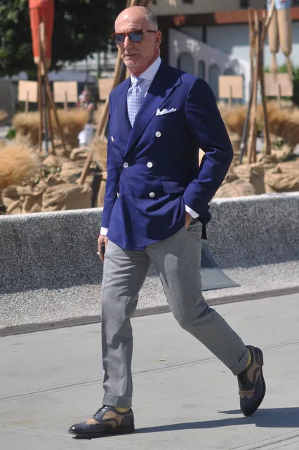 Blue blazer with grey trousers — tailored business casual Haymarket VA